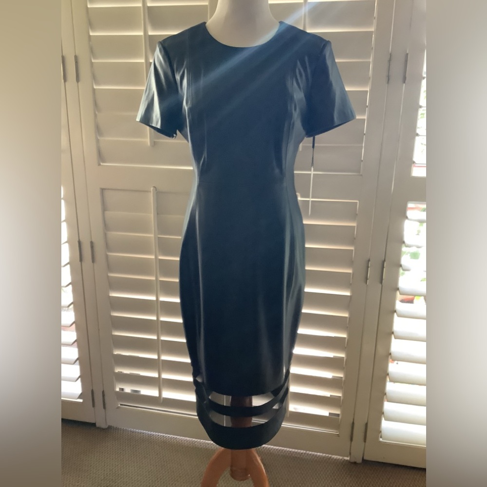 NWT Calvin Klein Black Leather Dress with “Cut out hem”